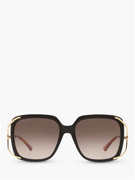 Gucci GG0647S Sunglass for Women .